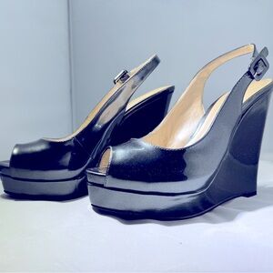 Nine West slingback platform wedge dark grey metallic
Size 8M